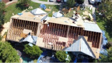 New roof on large townhouse complex, July 2023